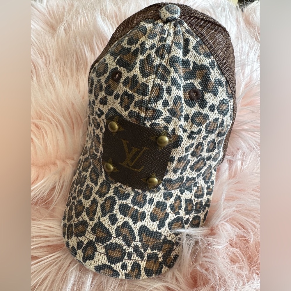 LV Brown Leopard Hat. Adjustable sizing. Distressed look but never worn.